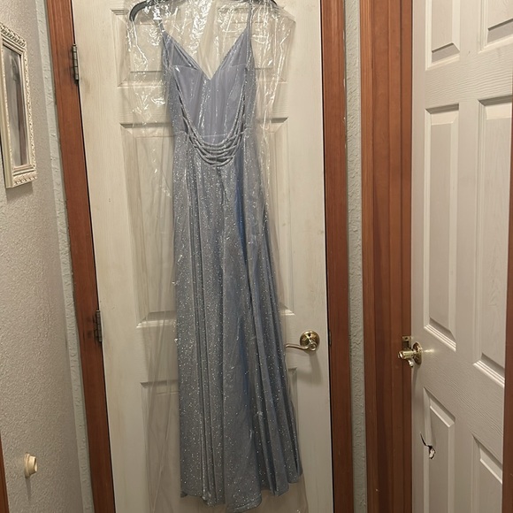 I am selling a sleeveless prom dress that is sparkly blue purplish a size small - Picture 2 of 7